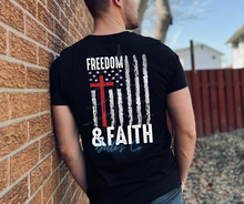 Load image into Gallery viewer, Make a bold statement with your new Freedom &amp; Faith shirt with white font. The design will be placed on the back with nothing on the font. 